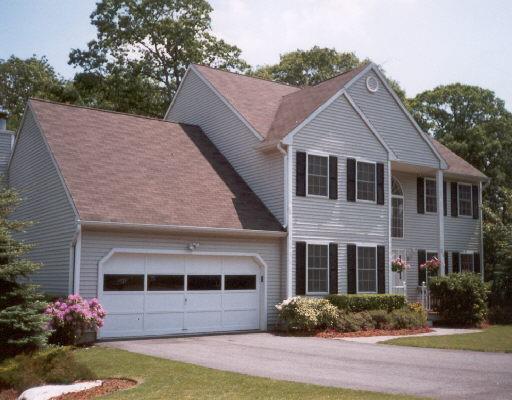 210 Pumpkin Ground Road Stratford, CT 06614 - Photo 1 of 1 a front view of a house with garden