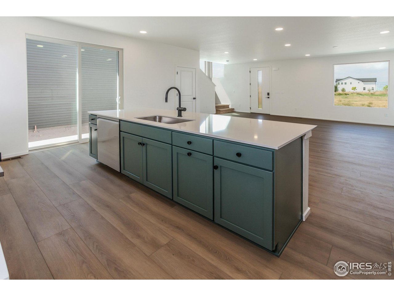 6126 Red Barn Road Fort Collins, CO 80528 - Photo 11 of 36 a bathroom with a double vanity sink and a mirror