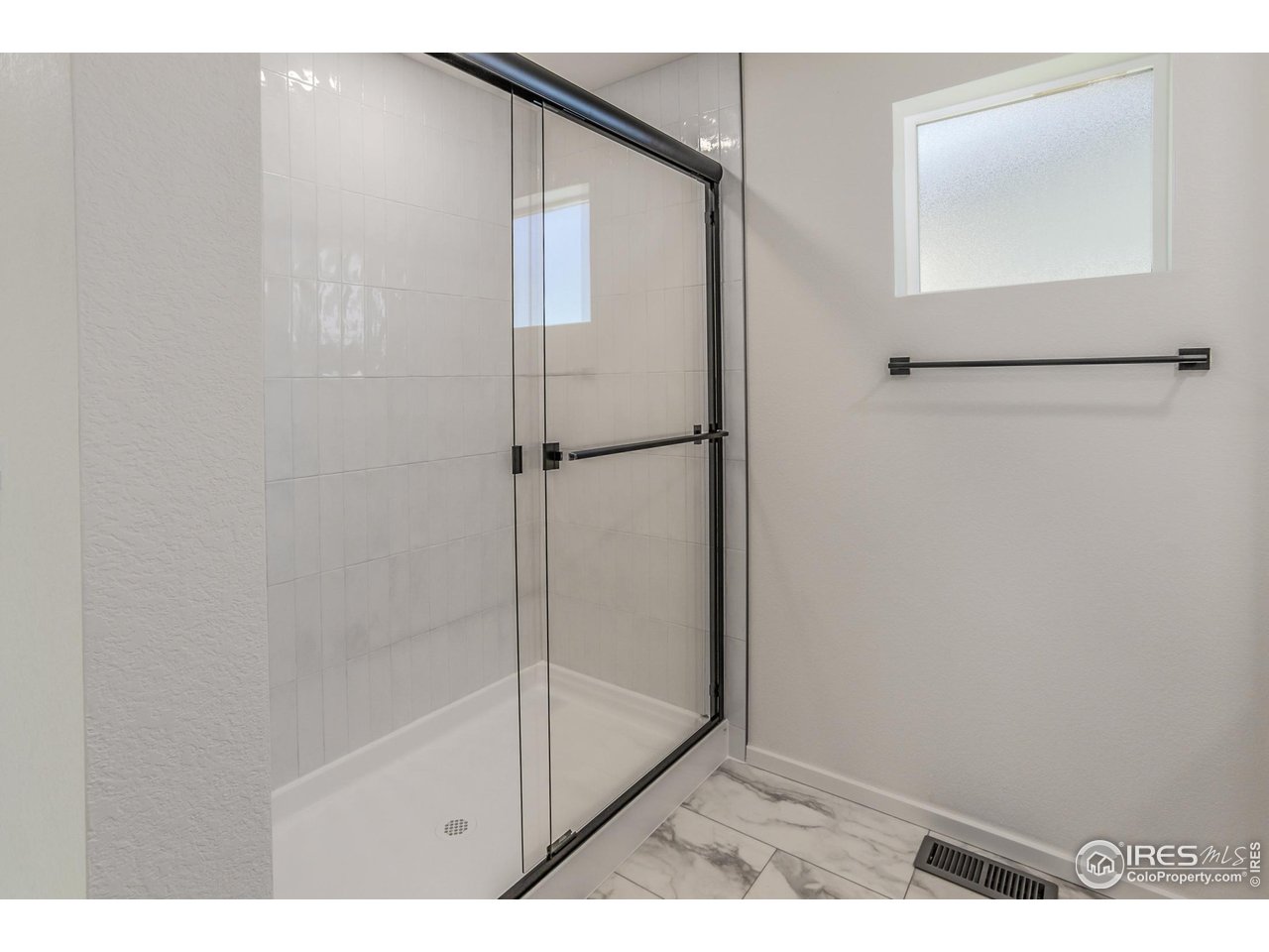 6126 Red Barn Road Fort Collins, CO 80528 - Photo 21 of 36 a bathroom with a shower