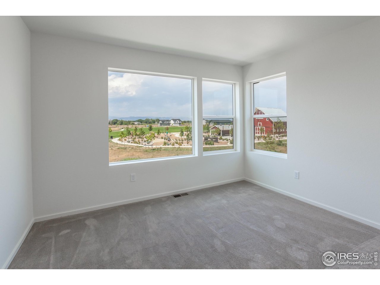 6126 Red Barn Road Fort Collins, CO 80528 - Photo 25 of 36 an empty room with windows