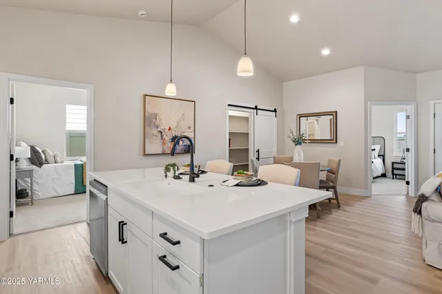 a view of living room with granite countertop furniture and fireplace
