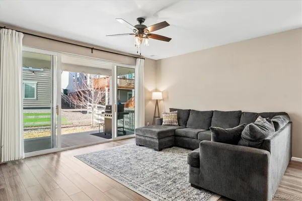 a living room with furniture and a window