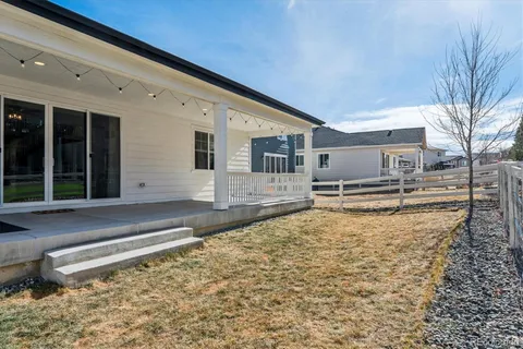 a house view with a backyard space