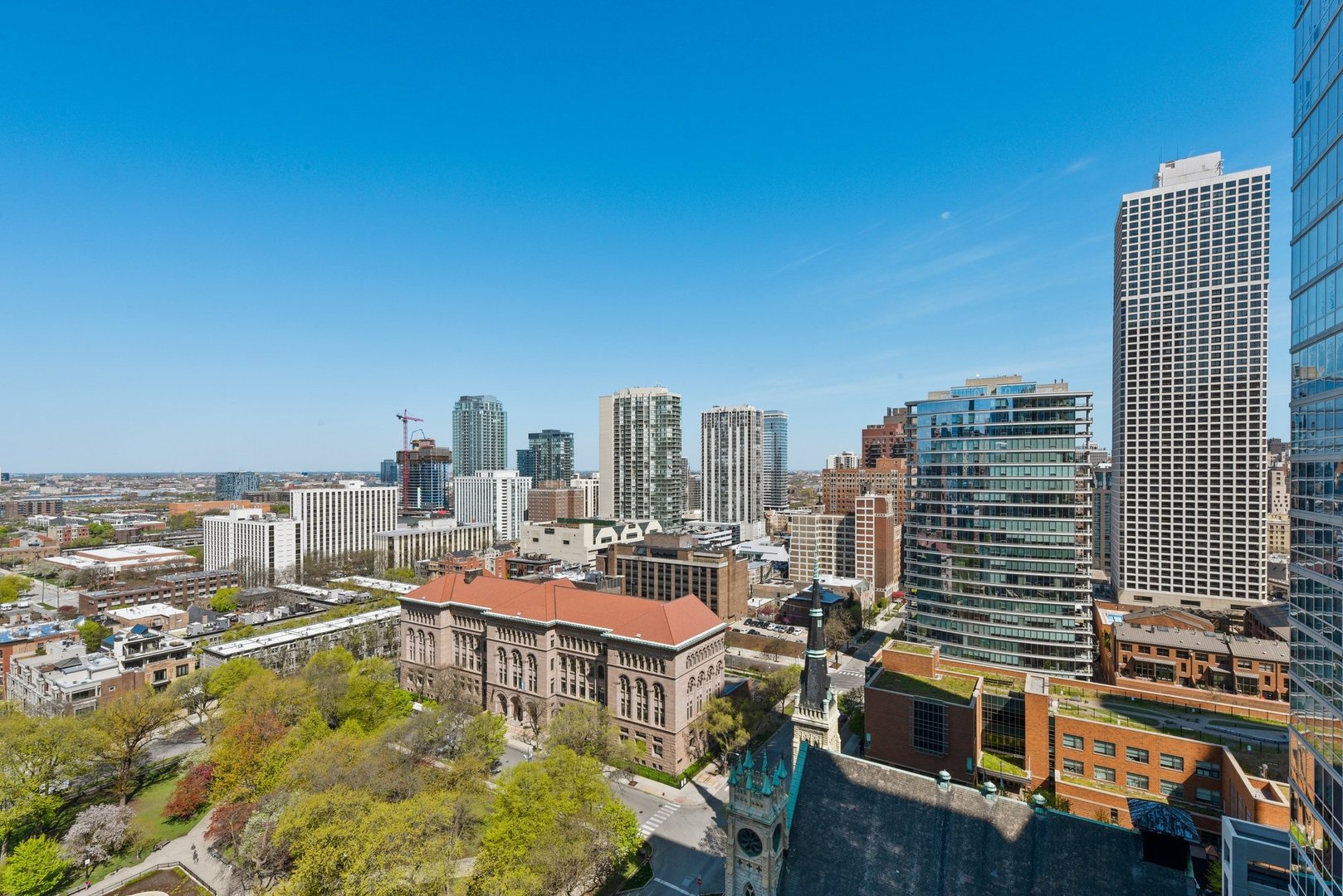 33 West Delaware Place, Unit 23D Chicago, IL 60610 - Photo 11 of 20 a view of a city with tall buildings