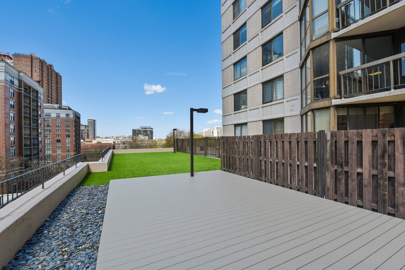 33 West Delaware Place, Unit 23D Chicago, IL 60610 - Photo 15 of 20 a view of pool with a yard