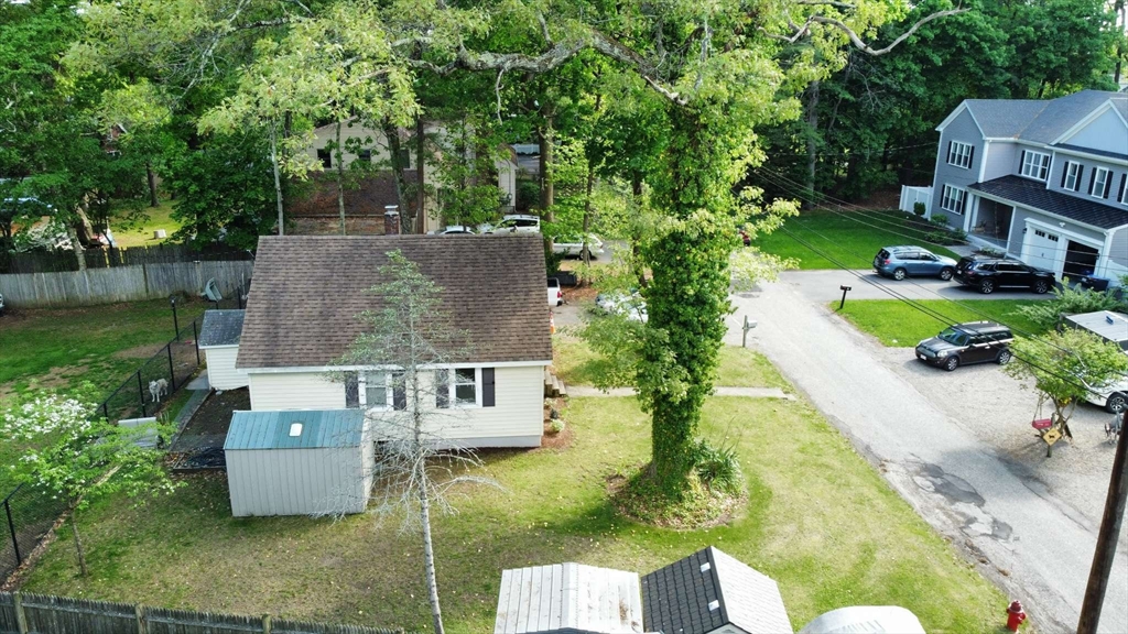 32 Birch Road Natick, MA 01760 - Photo 11 of 38 an aerial view of a house with garden space and street view