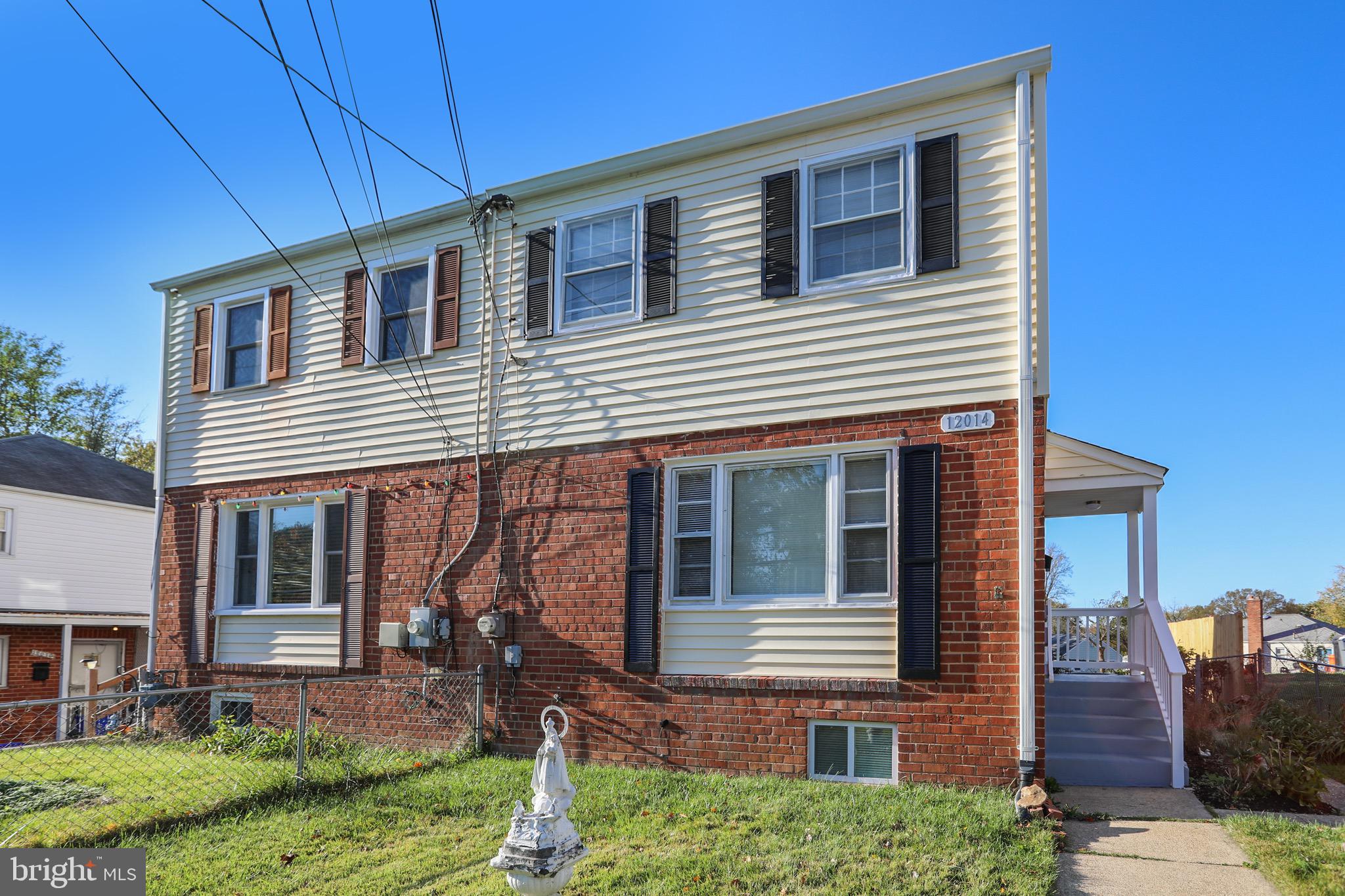 12014 Claridge Road Silver Spring, MD 20902 - Photo 2 of 28 Brick and siding end unit row house.