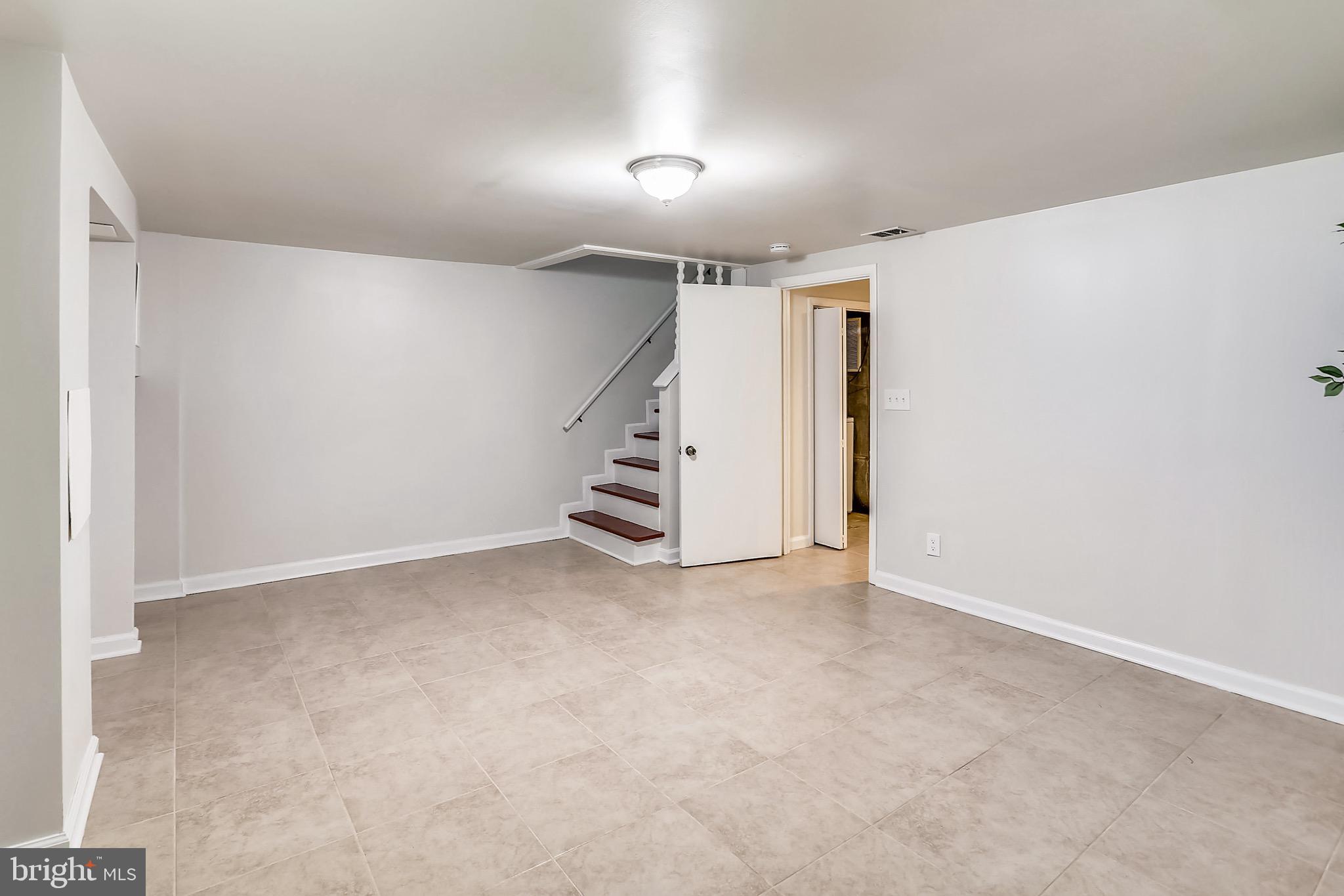 12014 Claridge Road Silver Spring, MD 20902 - Photo 22 of 28 View of family room in the finished basement.