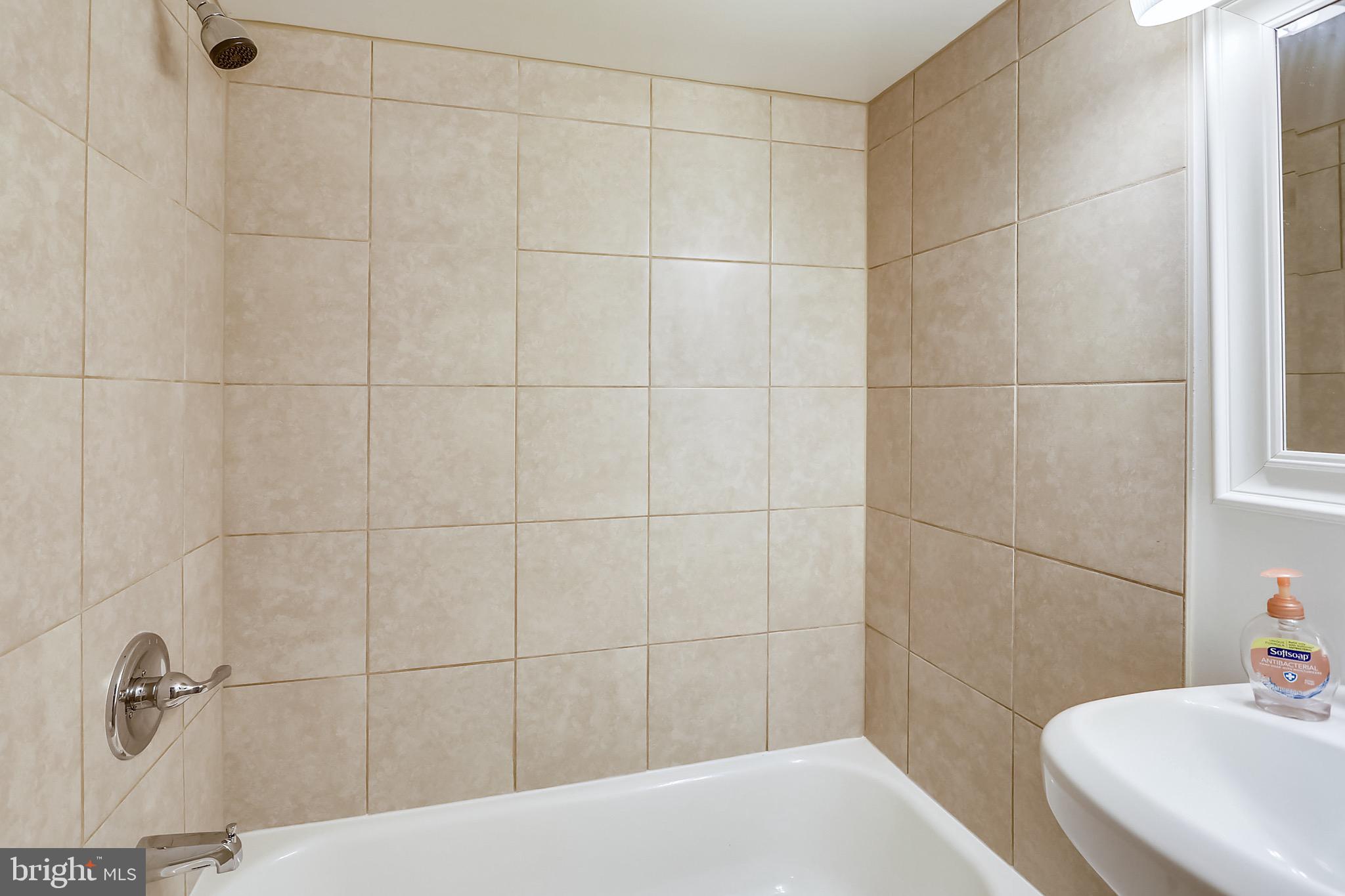 12014 Claridge Road Silver Spring, MD 20902 - Photo 25 of 28 Full bathroom with tub in finished basement.