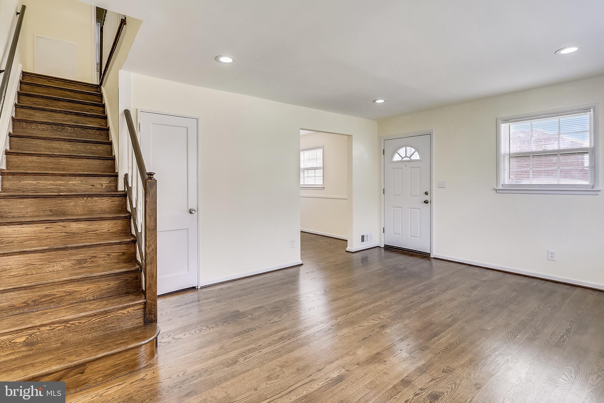 12014 Claridge Road Silver Spring, MD 20902 - Photo 6 of 28 Living room looking at entryway and those floors!