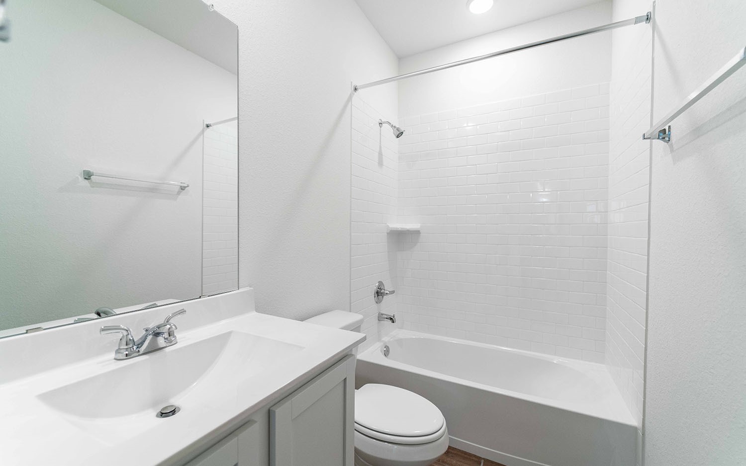 10656 Altitude Way Conroe, TX 77303 - Photo 14 of 30 a bathroom with a sink toilet and shower