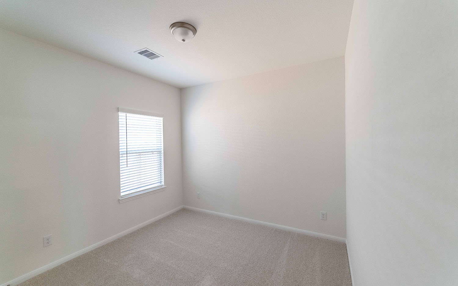 10656 Altitude Way Conroe, TX 77303 - Photo 10 of 30 an empty room with windows