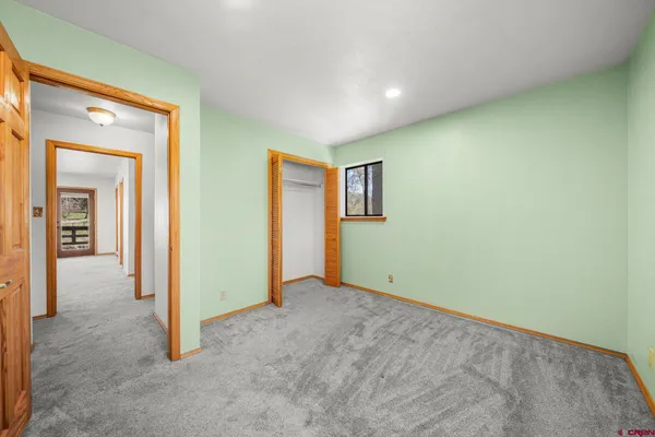 an empty room with window