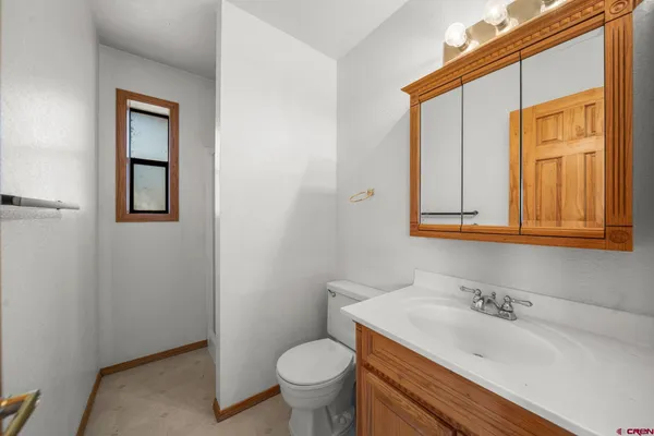 a bathroom with a sink and a toilet