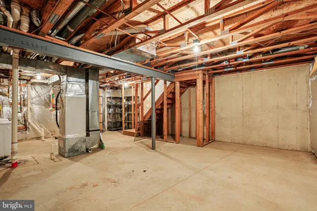 a view of a room with wooden walls