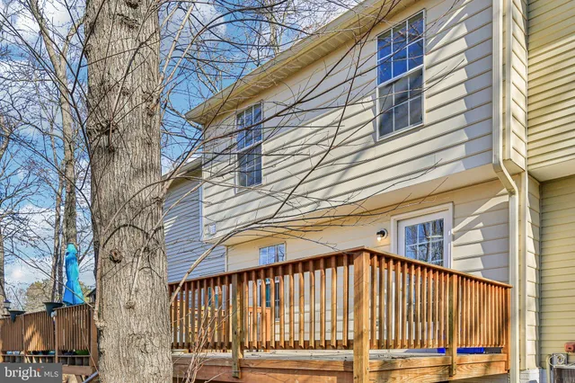 a view of a building with a roof deck