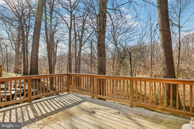 a view of a wooden roof deck