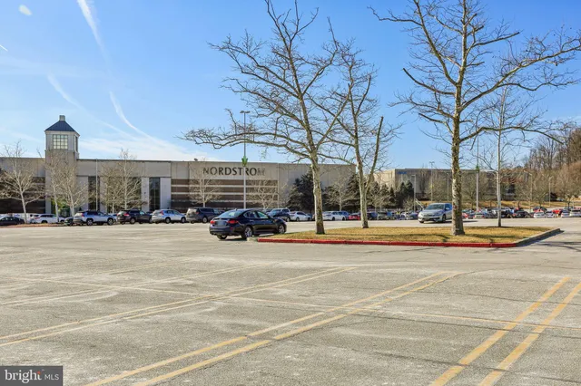 a view of a building with a yard