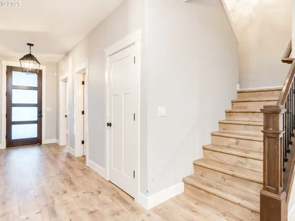 a view of entryway with white walls