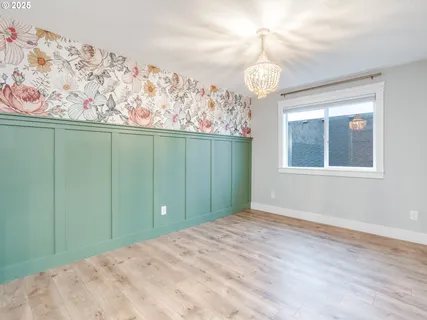 a view of a room with a large window