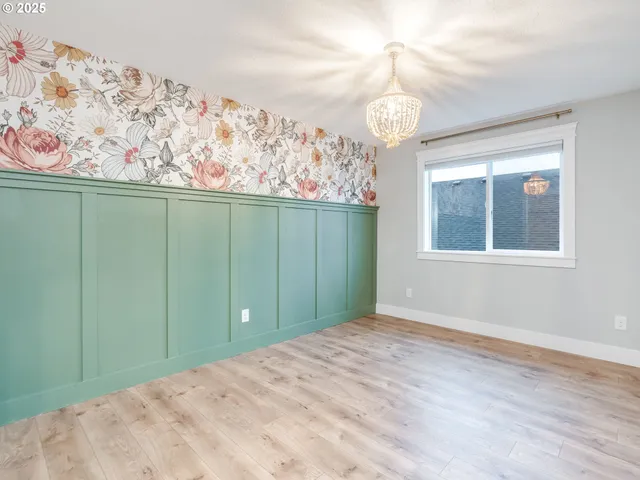 a view of a room with a large window