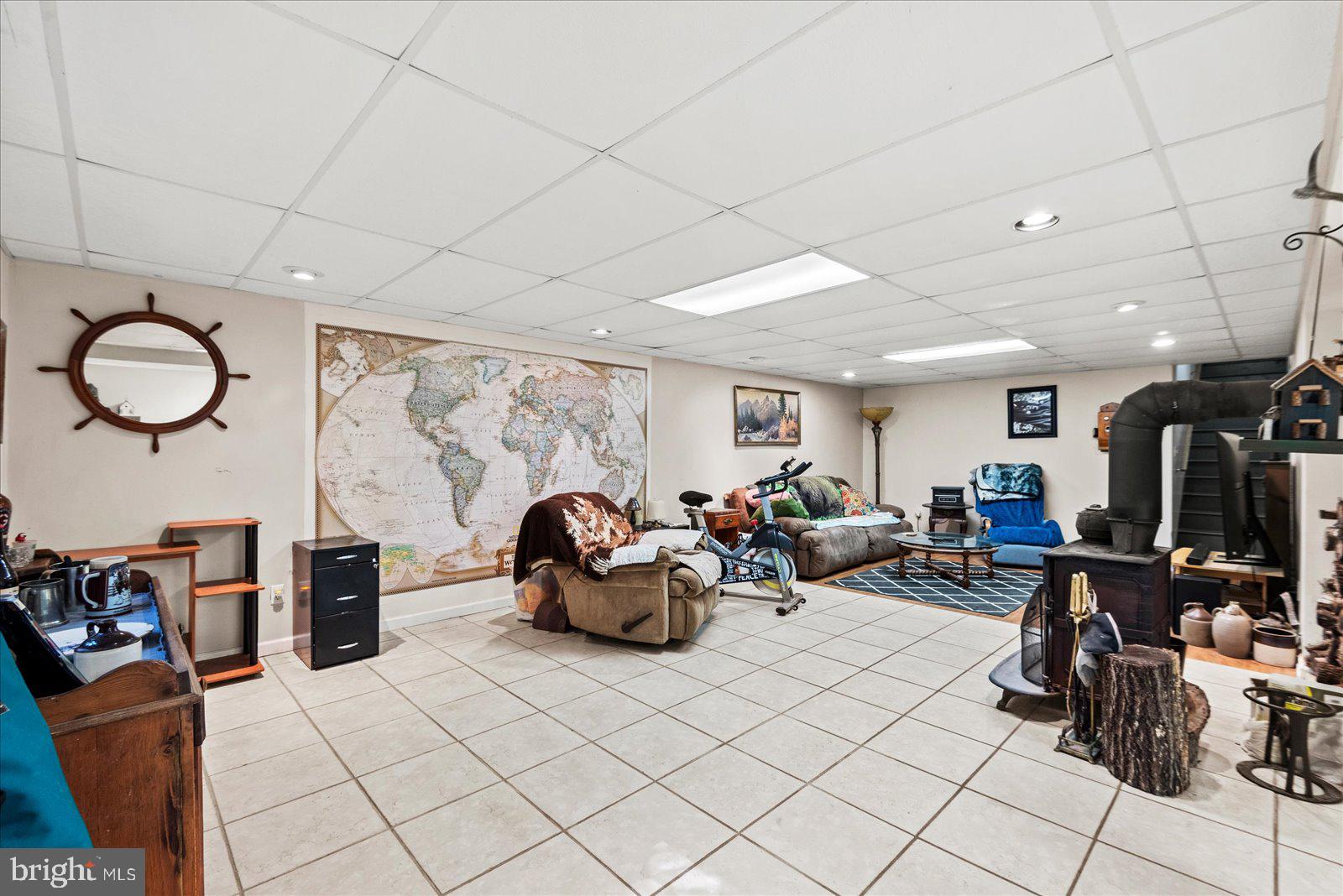 804 Buggy Lane Rochelle, VA 22738 - Photo 29 of 50 a living room with lots of furniture and gym equipment