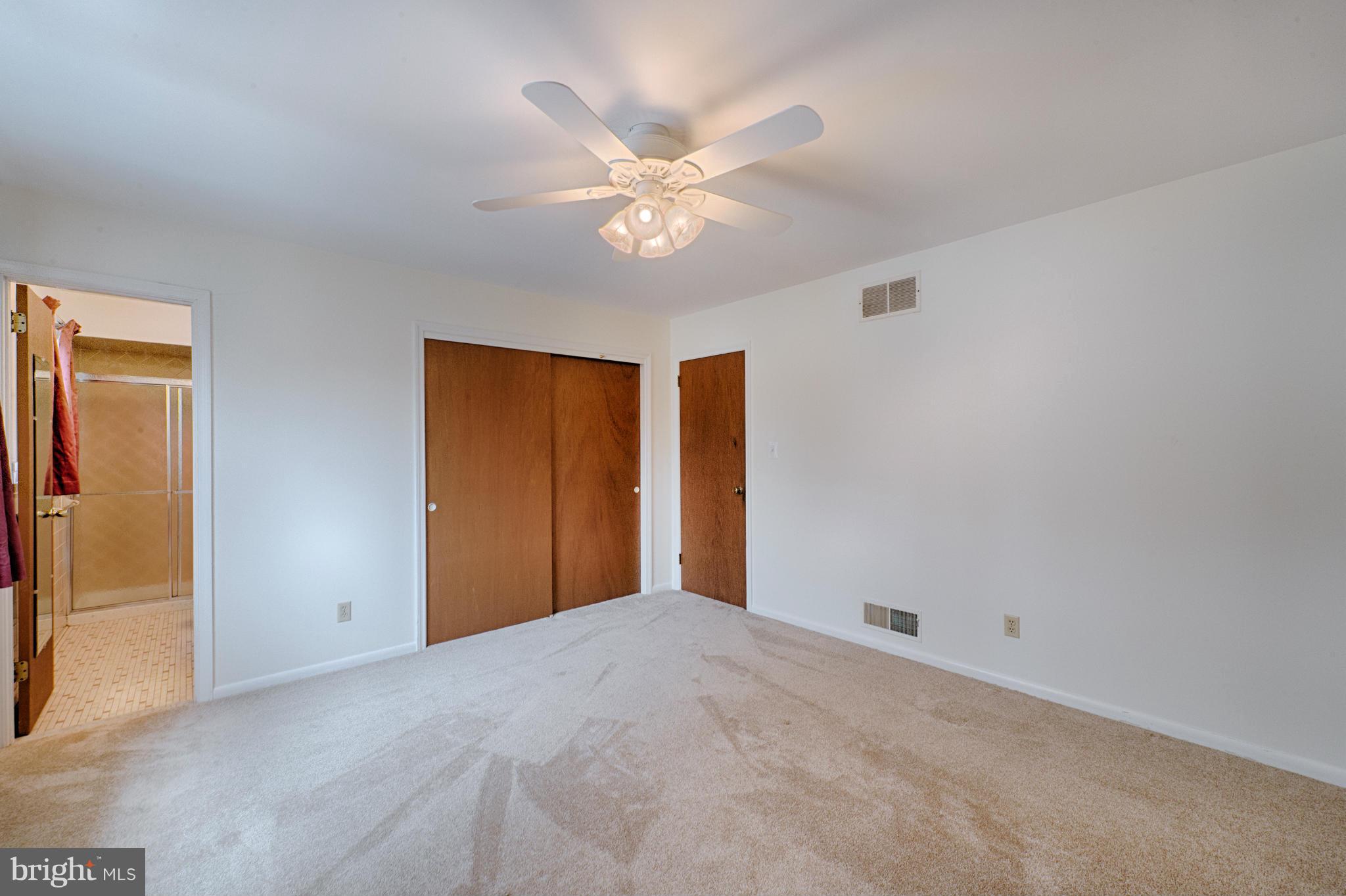 2801 Park Road Baldwin, MD 21013 - Photo 22 of 30 a view of a livingroom with a ceiling fan and window