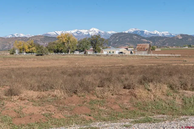 a view of large mountain with sunset view