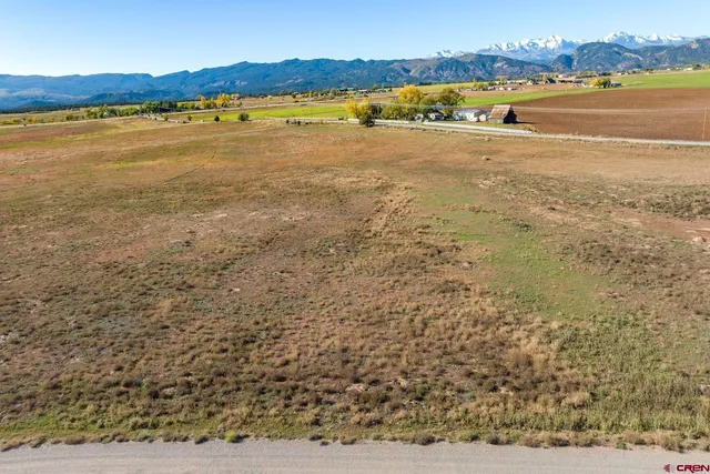 a view of an ocean and a mountain