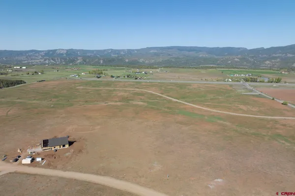 a view of a lake with mountain