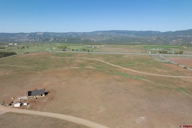 a view of a lake with mountain