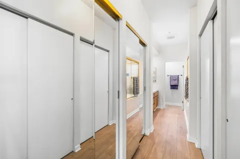 a view of a bathroom with a tub and shower