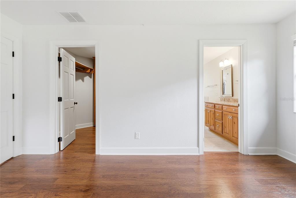 2331 D R Bryant Road Lakeland, FL 33810 - Photo 34 of 74 a view of a hallway with wooden floor
