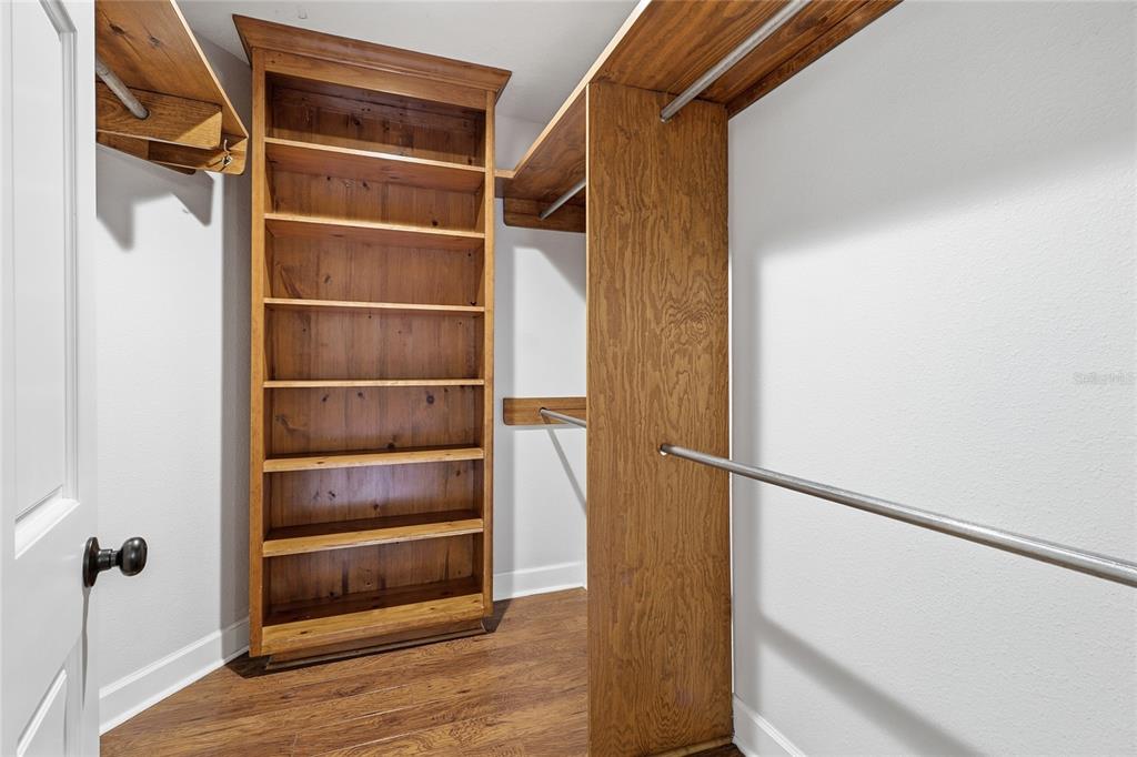 2331 D R Bryant Road Lakeland, FL 33810 - Photo 35 of 74 a view of walk in closet with empty racks