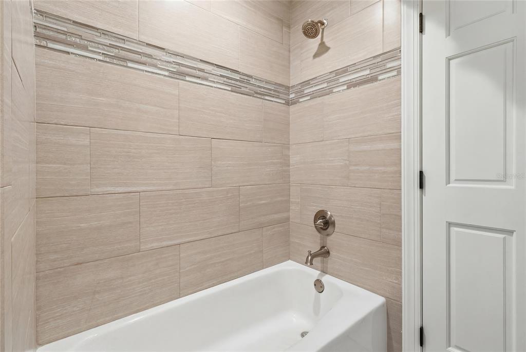 2331 D R Bryant Road Lakeland, FL 33810 - Photo 43 of 74 a bathroom with a bathtub