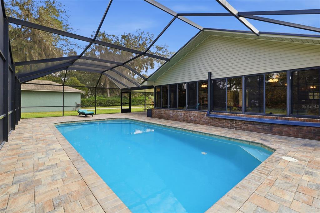 2331 D R Bryant Road Lakeland, FL 33810 - Photo 61 of 74 a view of a swimming pool with a patio