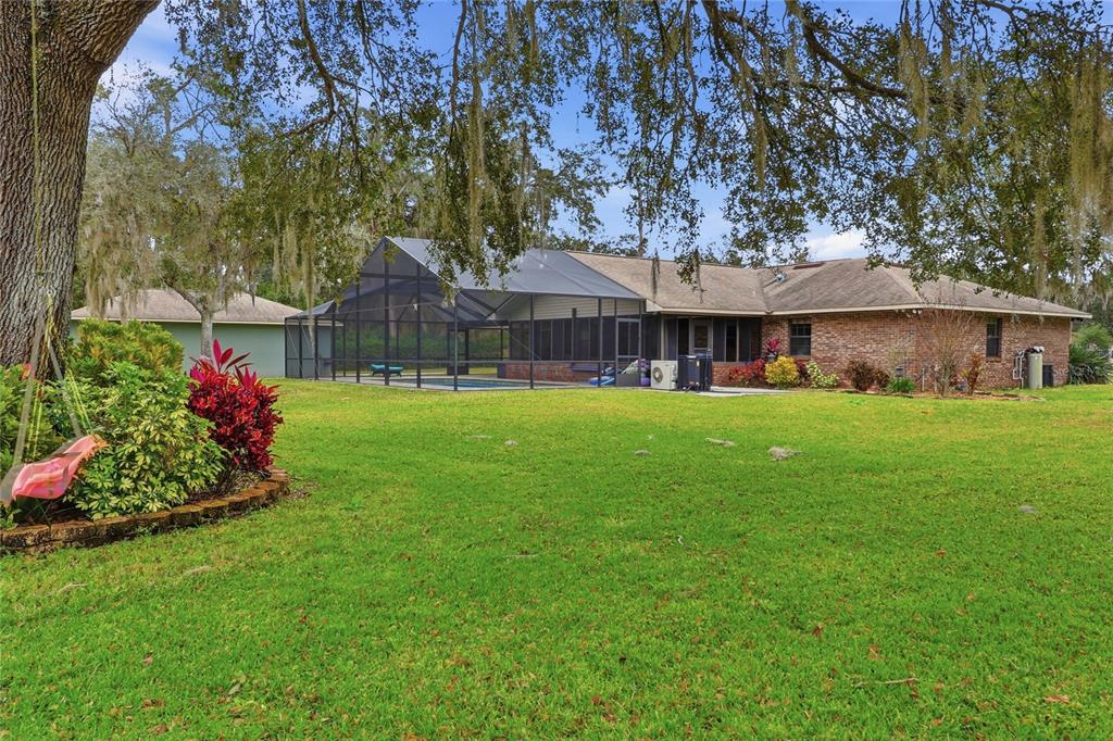 2331 D R Bryant Road Lakeland, FL 33810 - Photo 71 of 74 a house with garden in front of it