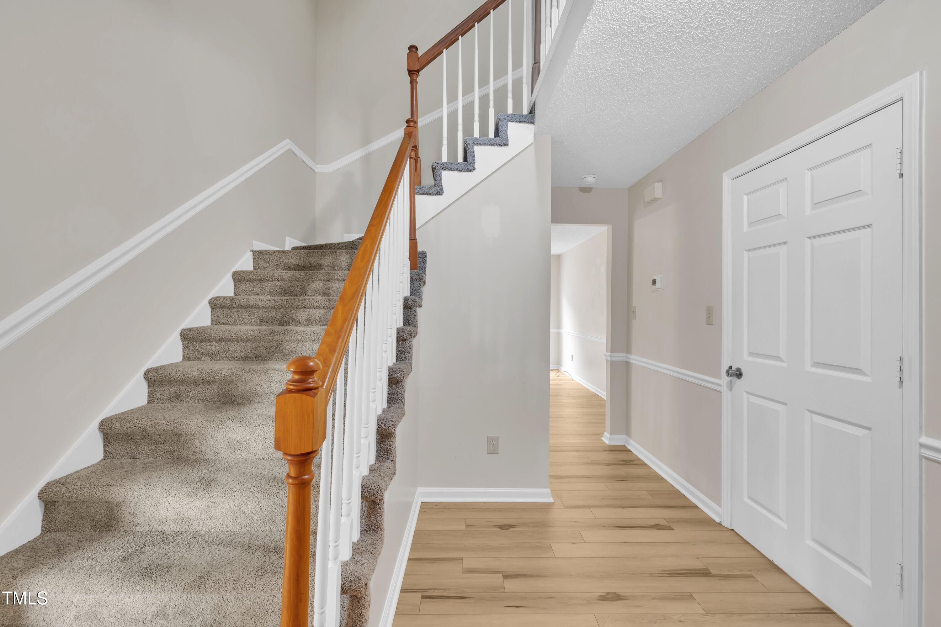 397 Meadow Road Kenly, NC 27542 - Photo 7 of 53 a view of entryway and hall with wooden floor