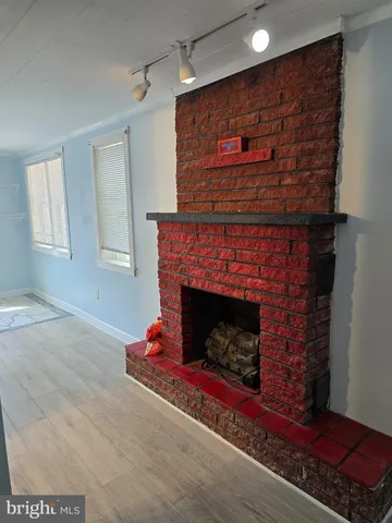 a living room with a fireplace