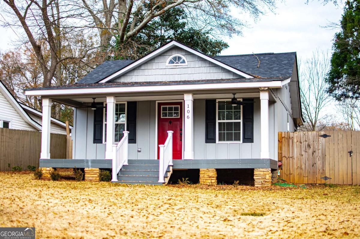 106 Mara Street Carrollton, GA 30117 - Photo 2 of 52 a front view of a house with a yard