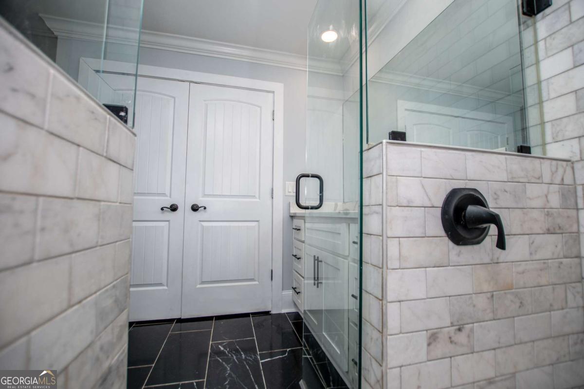 106 Mara Street Carrollton, GA 30117 - Photo 36 of 52 a bathroom with a shower