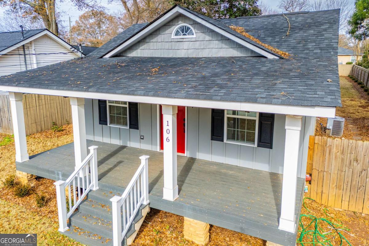 106 Mara Street Carrollton, GA 30117 - Photo 47 of 52 a front view of a house with a yard