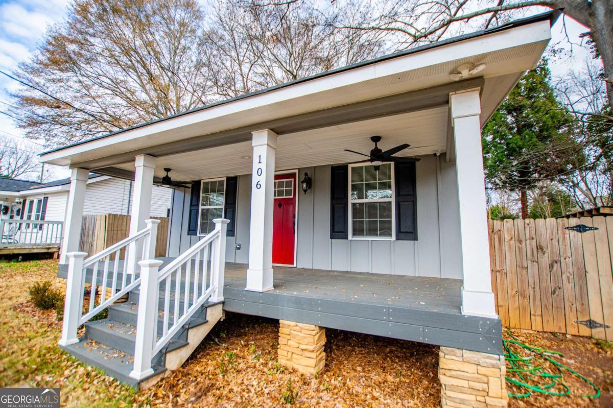 106 Mara Street Carrollton, GA 30117 - Photo 7 of 52 a front view of a house with a porch