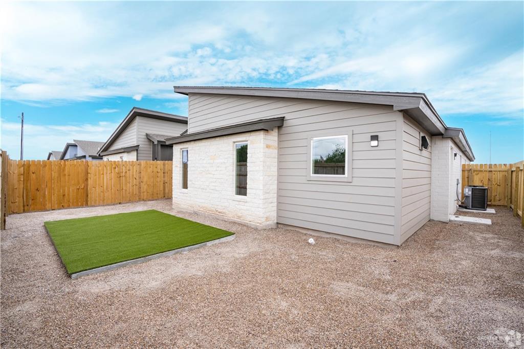 4013 Jenna Lane, Unit D Weslaco, TX 78599 - Photo 14 of 24 a view of backyard with small cabin