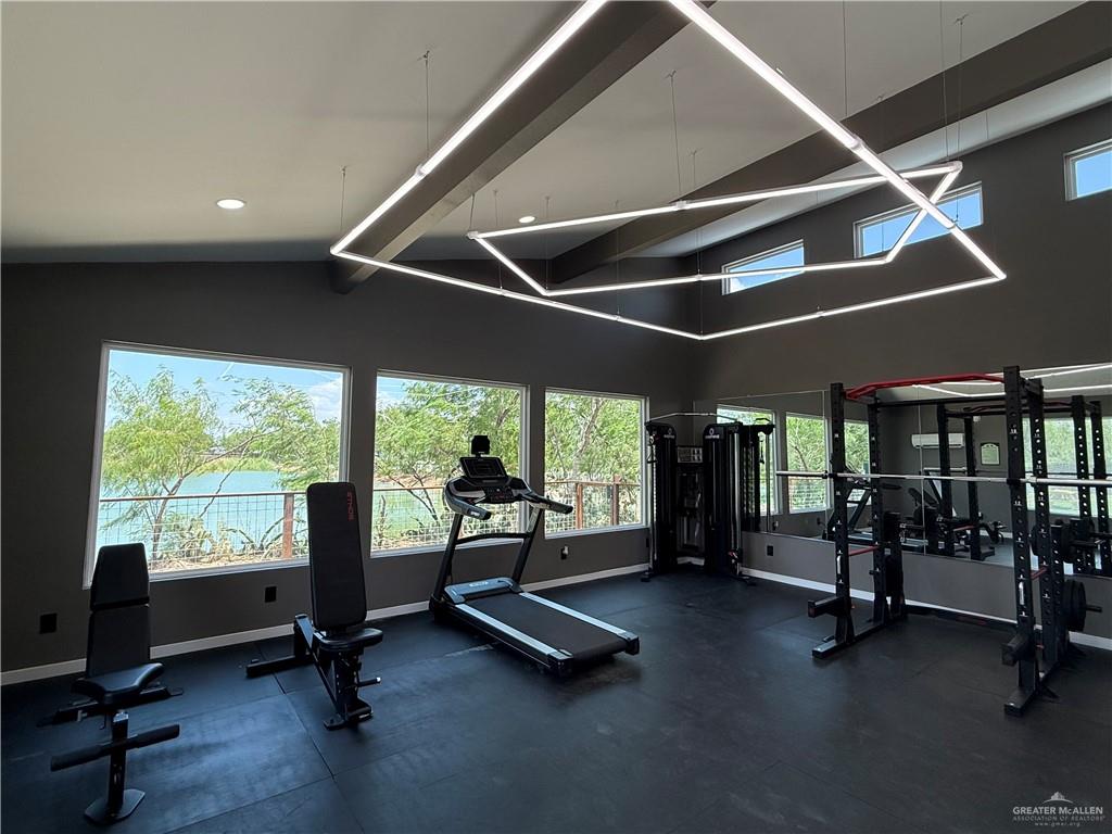 4013 Jenna Lane, Unit D Weslaco, TX 78599 - Photo 19 of 24 a view of a room with gym equipment