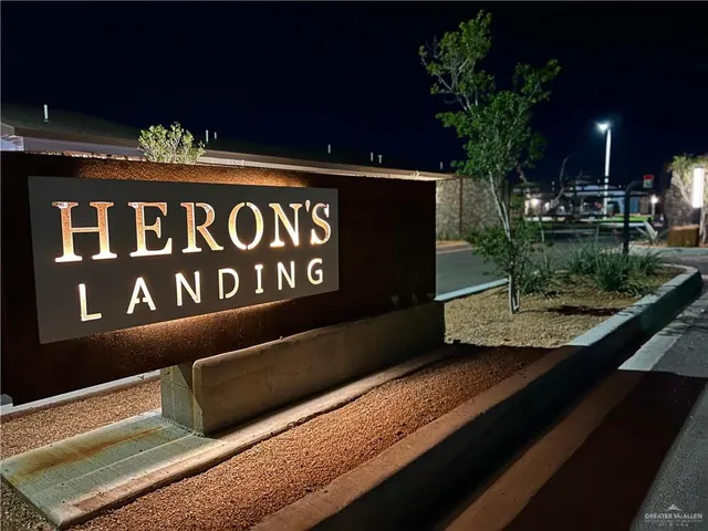 a view of a street with benches