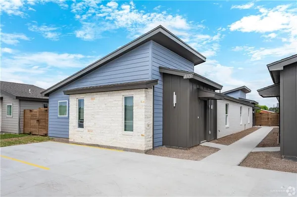 a front view of a house with a garage