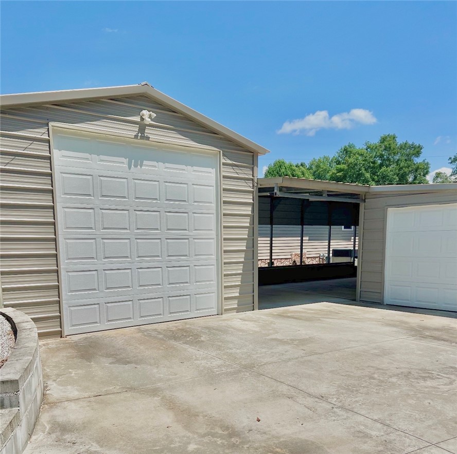1549 Greenfield Road Westminster, SC 29693 - Photo 42 of 49 Secure, spacious outbuildings offer ample parking and storage with easy access.
