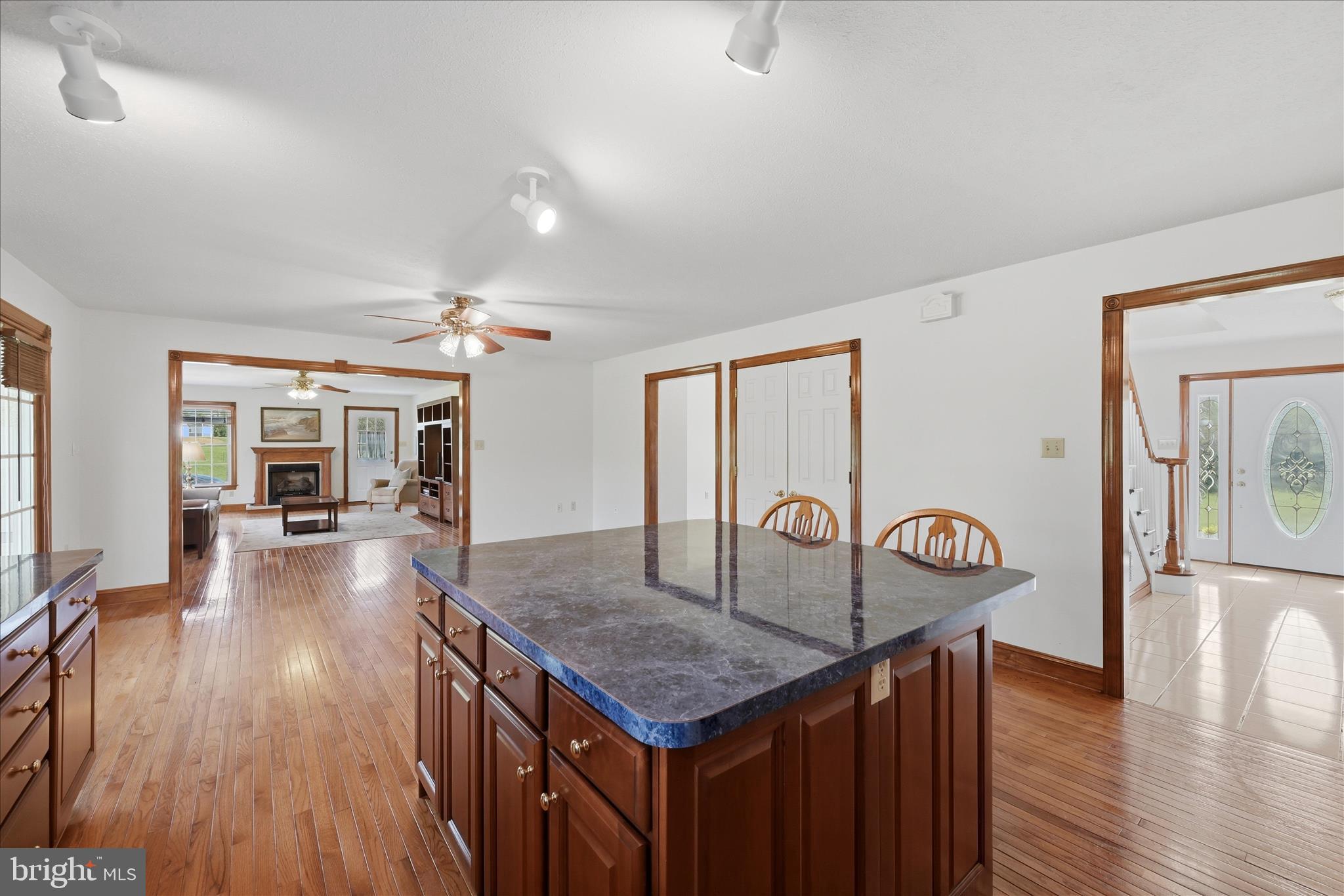412 Ruebuck Road Clear Brook, VA 22624 - Photo 11 of 43 a view of a livingroom with furniture wooden floor and chandelier