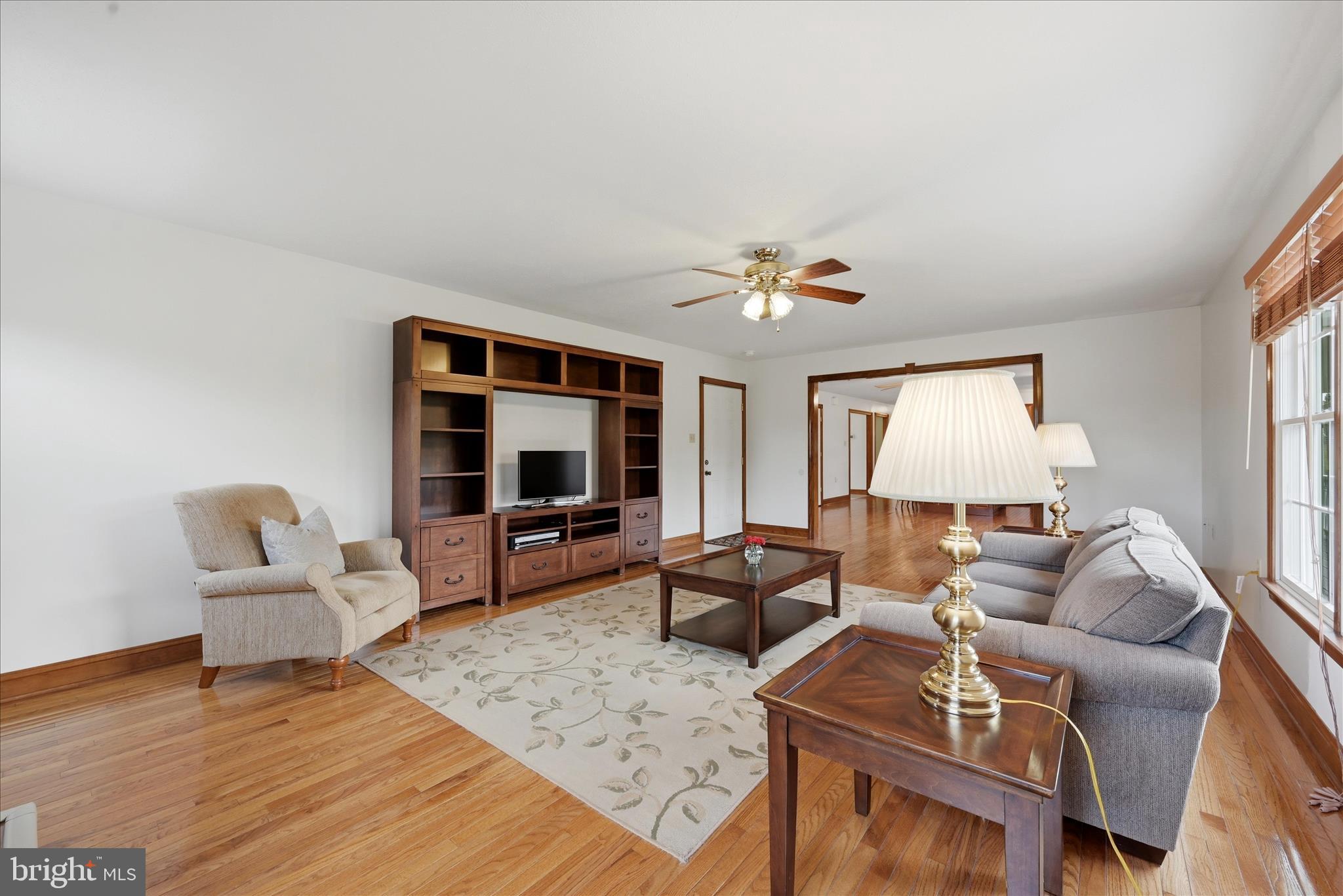 412 Ruebuck Road Clear Brook, VA 22624 - Photo 13 of 43 a living room with furniture and a flat screen tv